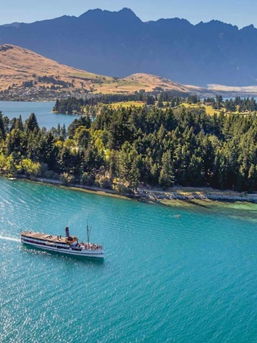 TSS Earnslaw cruising on Lake Wakatipu with Walter Peak in the background.