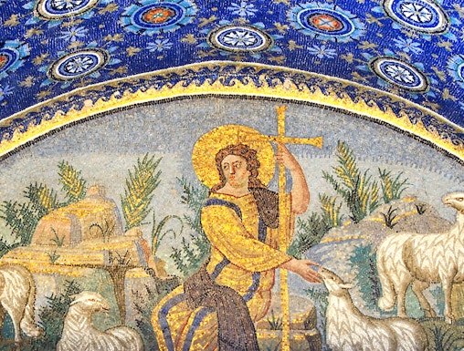 Ravenna mosaic depicting a shepherd with sheep under a blue starry sky.