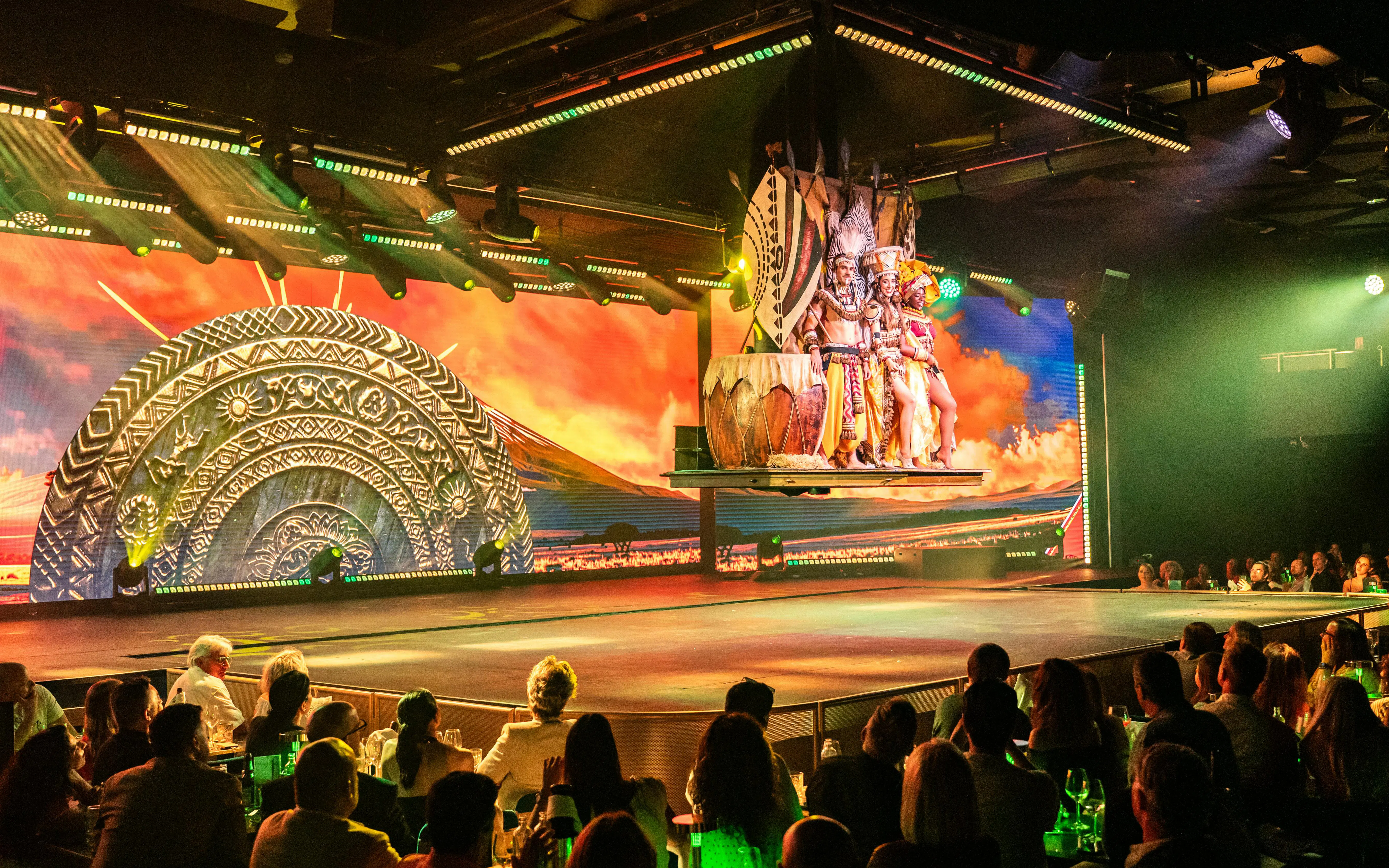 Performance at Sala Scala Gran Canaria with performers in traditional costumes on stage.