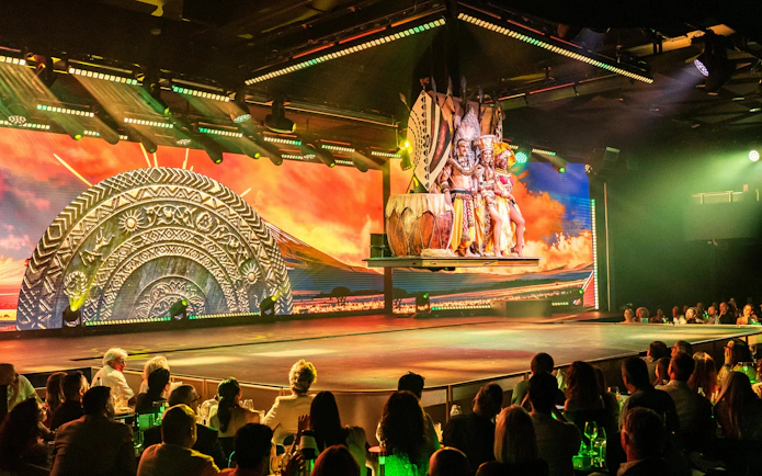Performance at Sala Scala Gran Canaria with performers in traditional costumes on stage.