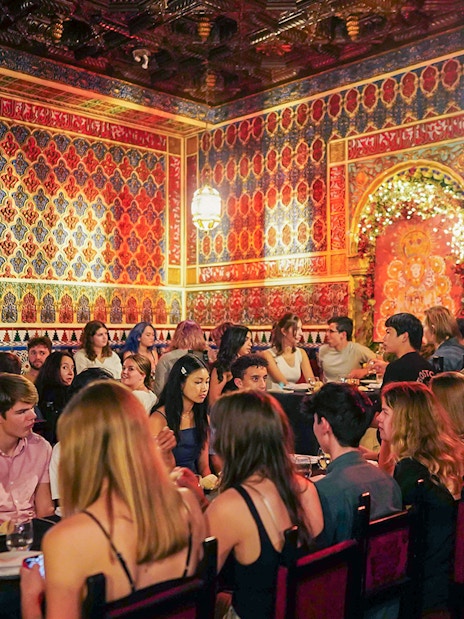 Tourists dining at Torres Bermejas Flamenco show in Madrid.