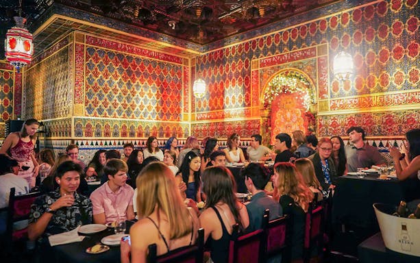 Tourists dining at Torres Bermejas Flamenco show in Madrid.