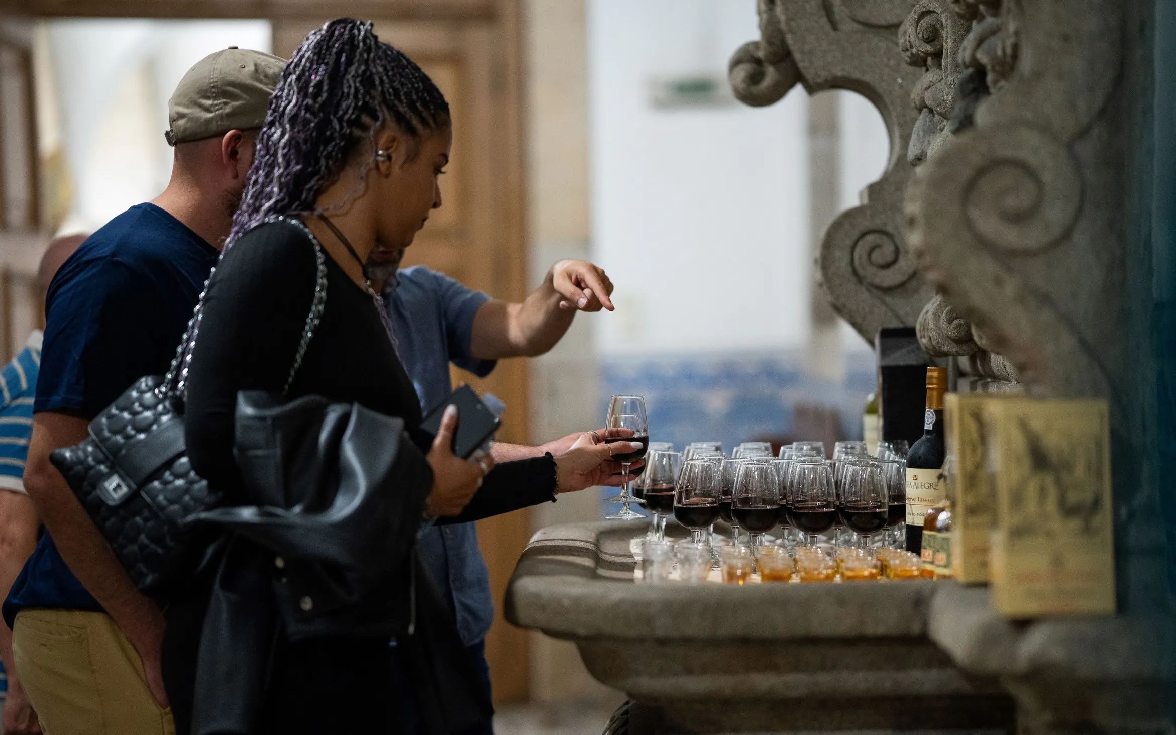 Tasting Port wine and Singeverga liqueur at a historic venue.