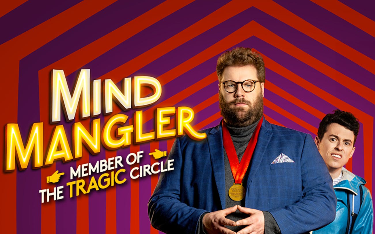 Mind Mangler in blue suit with medal, Tragic Circle show poster.