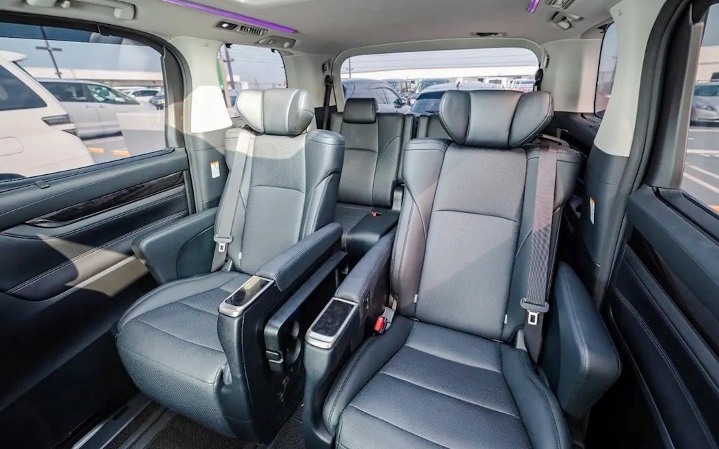 Interior seating of shuttle transfer to Tokyo Disneyland.