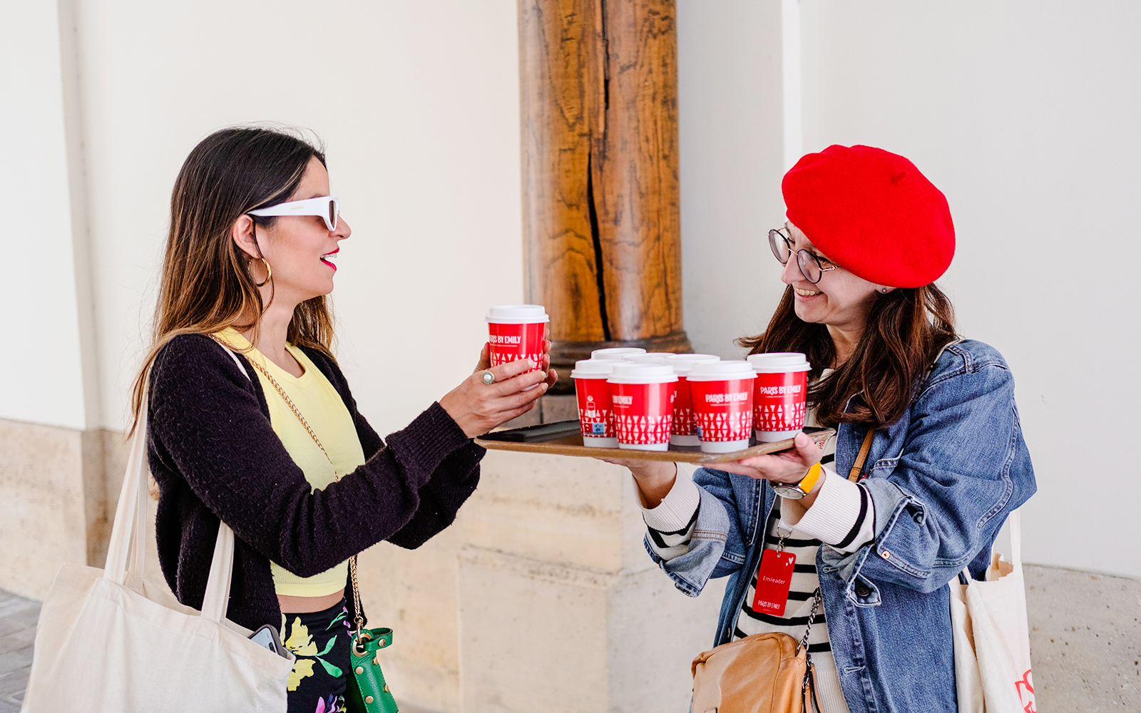 Person serving drinks during Emily in Paris Food Tour.