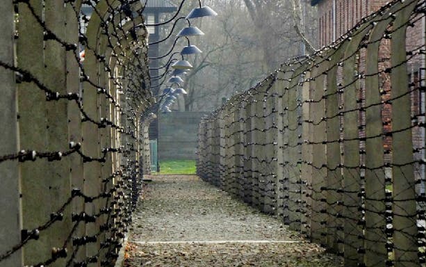 Barbed wire fences at Auschwitz-Birkenau concentration camp, Poland.