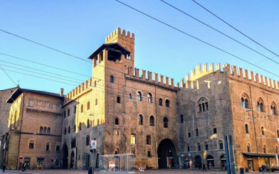 Medieval building in Bologna, Italy, featured in a self-guided murder mystery city exploration game.