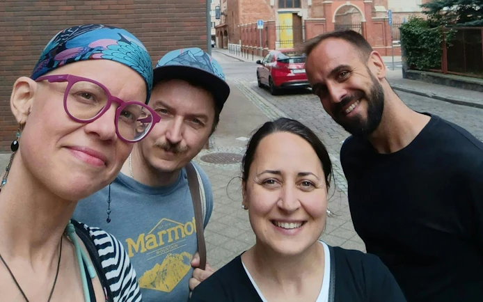 Group enjoying a self-guided city exploration game in Gdansk.