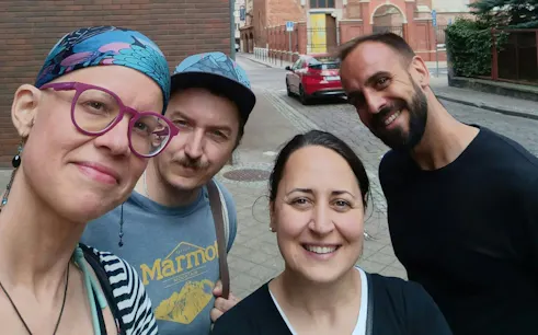 Group enjoying a self-guided city exploration game in Gdansk.