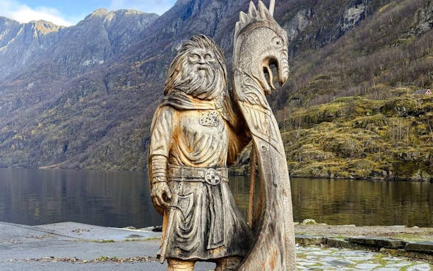 Gudvangen Viking statue by fjord in Vikings Village, Norway.