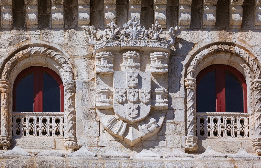 Belém Tower with royal coat of arms, part of Belém Essential Combo tour, Lisbon.