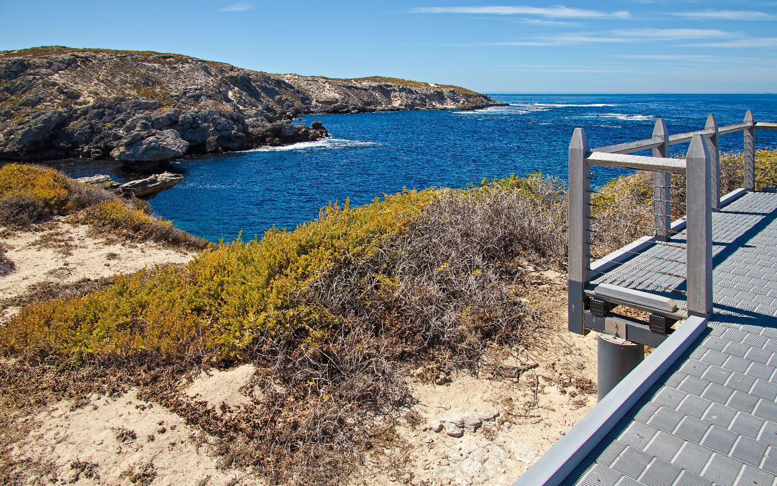 Lookout view of rocky coastline and ocean at Cape Vlamingh, Rottnest Island.