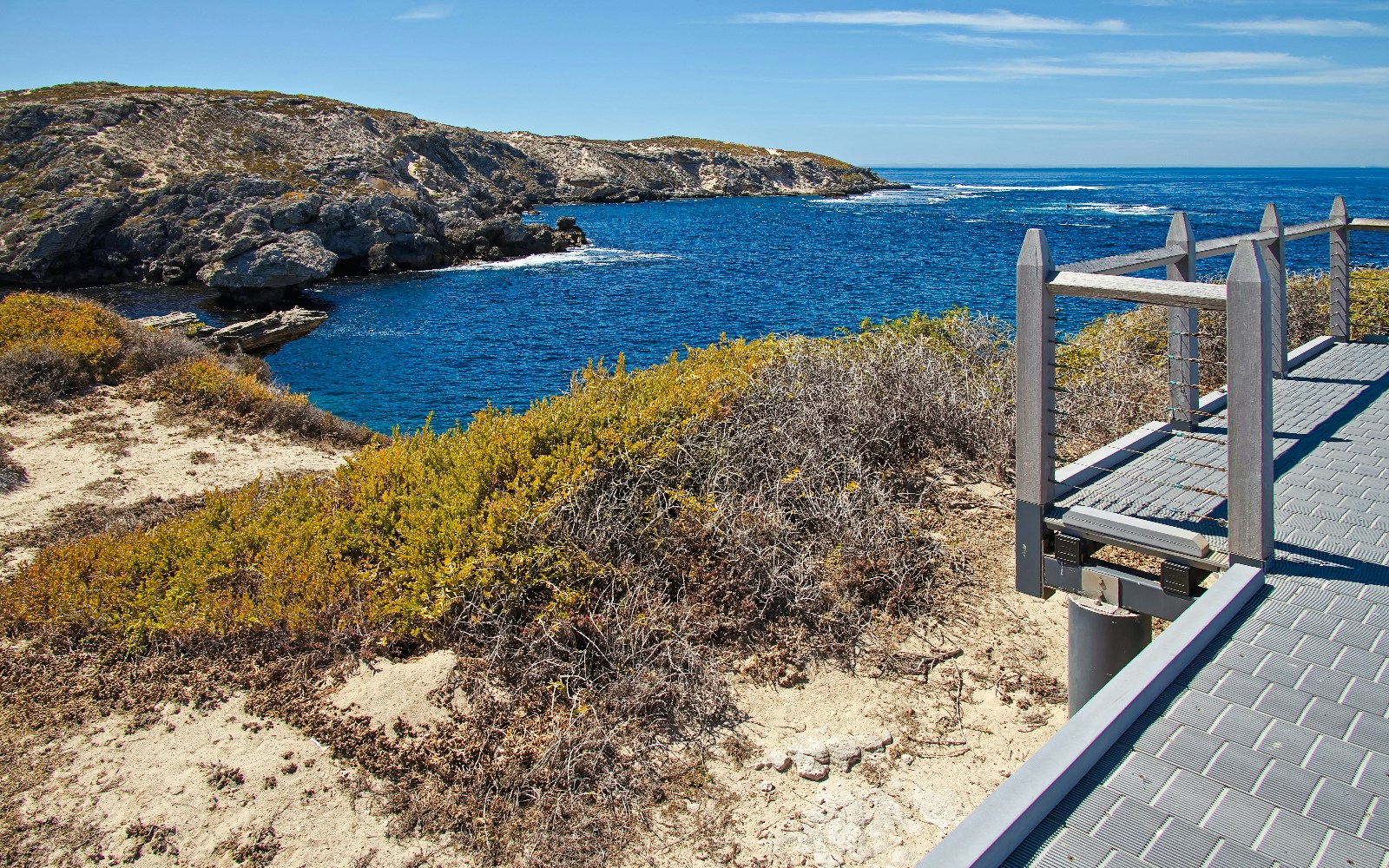 Lookout view of rocky coastline and ocean at Cape Vlamingh, Rottnest Island.