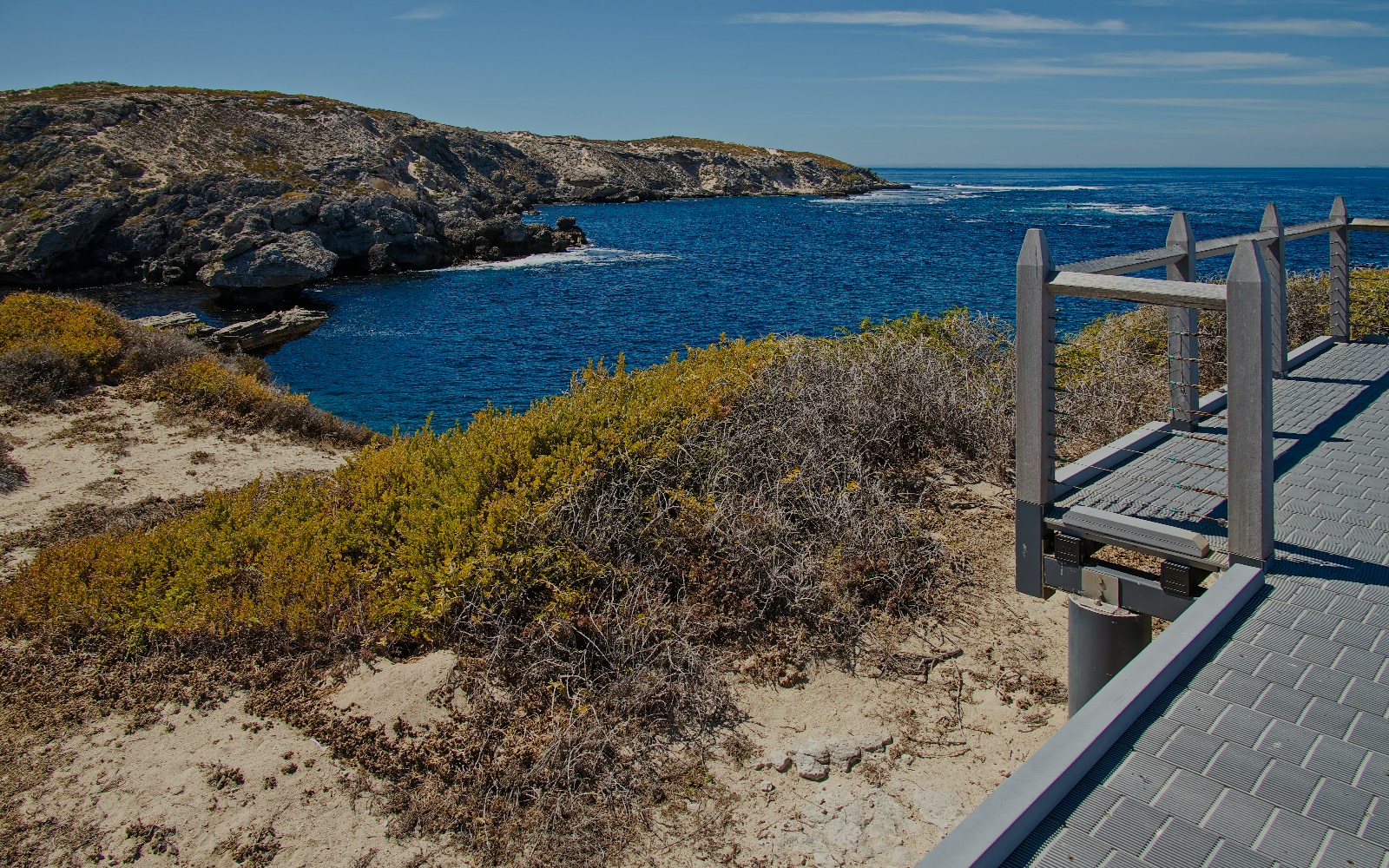 Lookout view of rocky coastline and ocean at Cape Vlamingh, Rottnest Island.