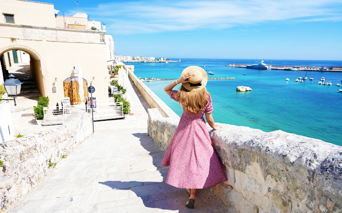Woman overlooking the sea from a stone walkway on the Gallipoli Peninsula.