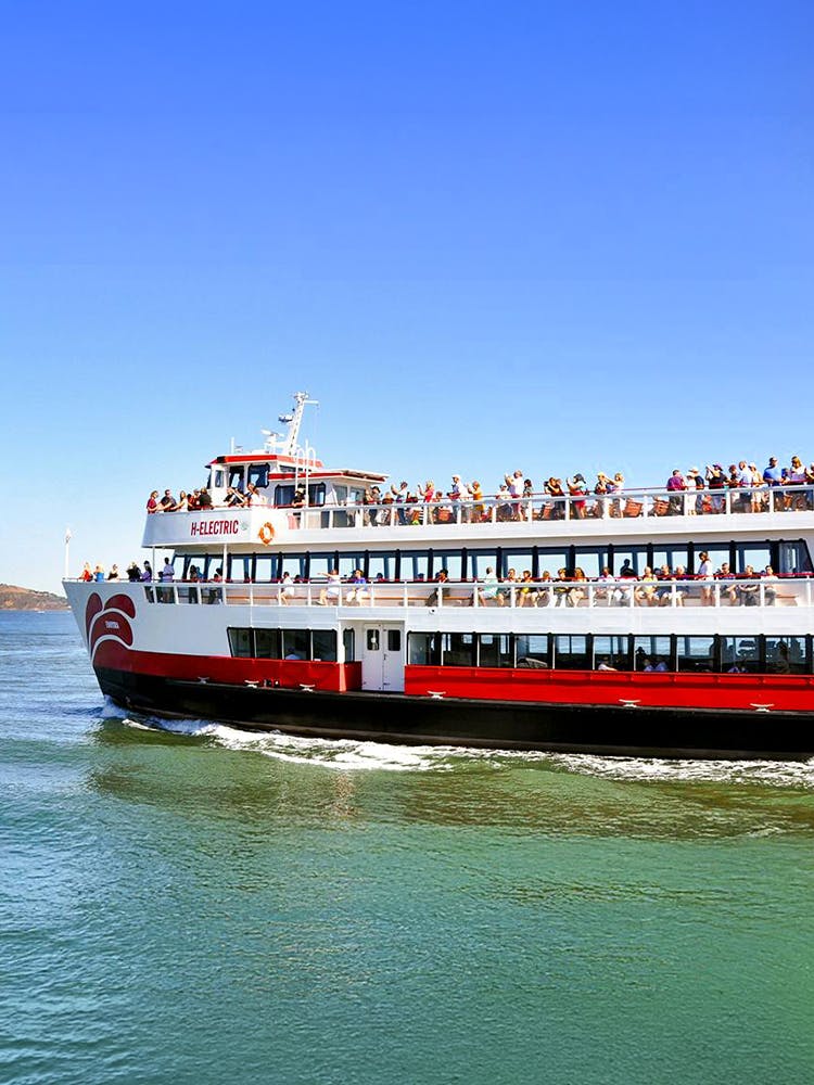 Golden Gate Bay cruise ship with passengers on San Francisco waters, USA.