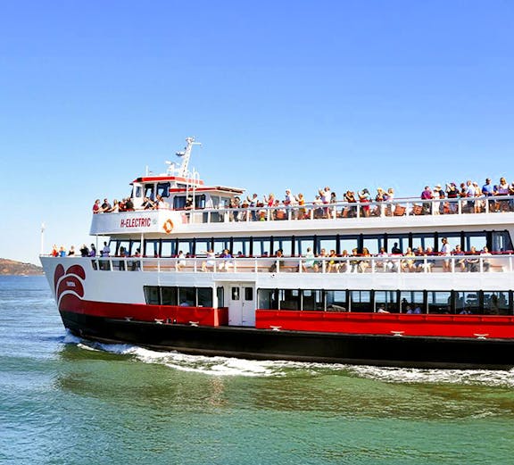Golden Gate Bay cruise ship with passengers on San Francisco waters, USA.