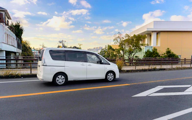 White van on a road, part of the St Tropez & Port Grimaud Day Tour from Nice.