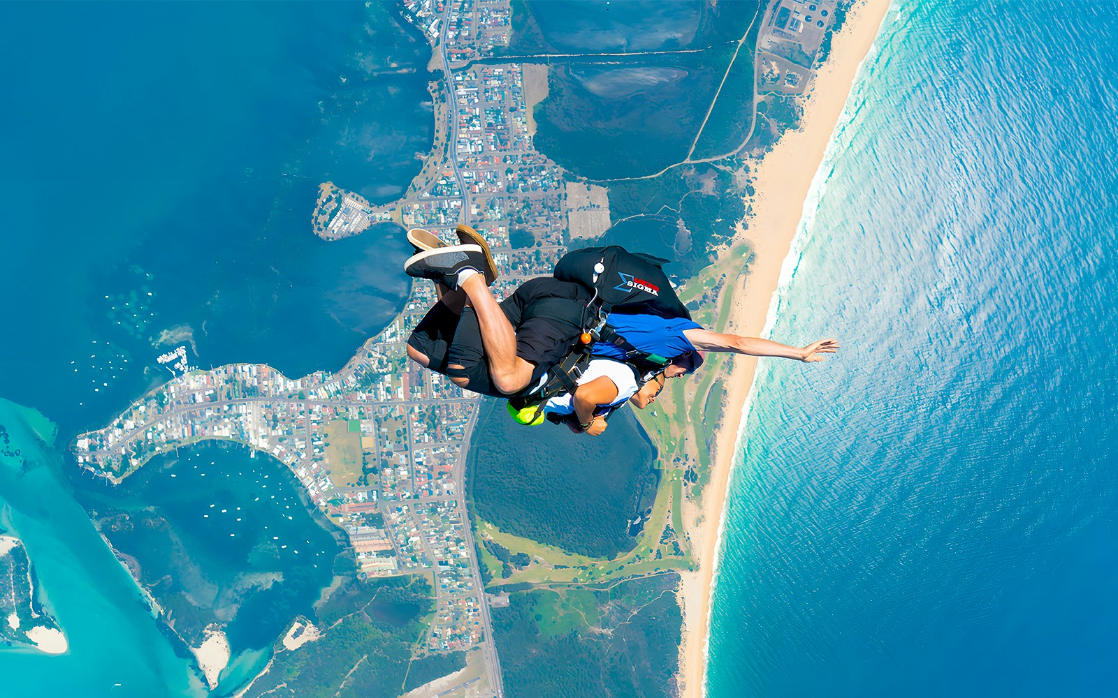 A guest skydiving over Newcastle, Australia
