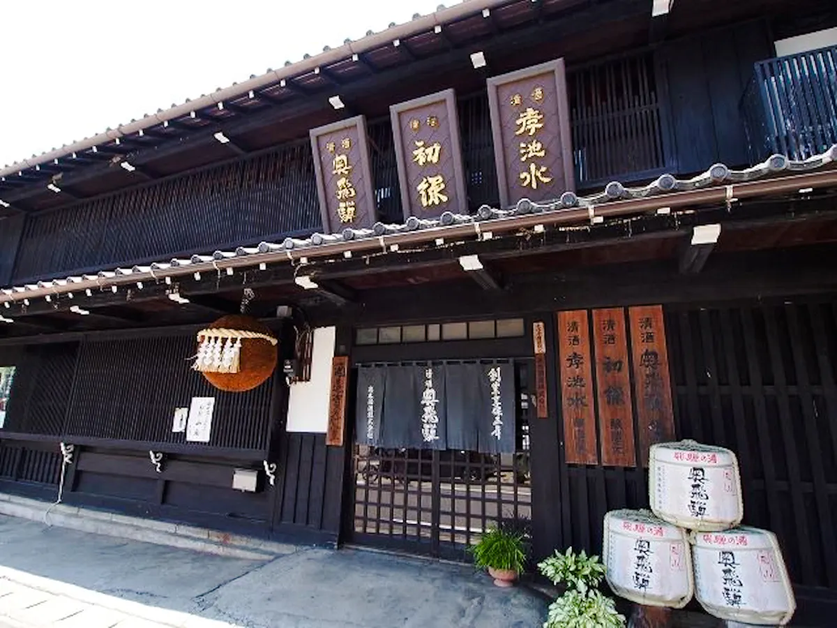 Okuhida Brewery entrance with traditional sake barrels, Gero, Gifu.
