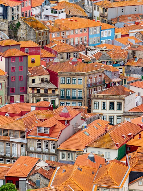 Aerial view of colorful rooftops in Porto near Misericórdia Museum and Church.