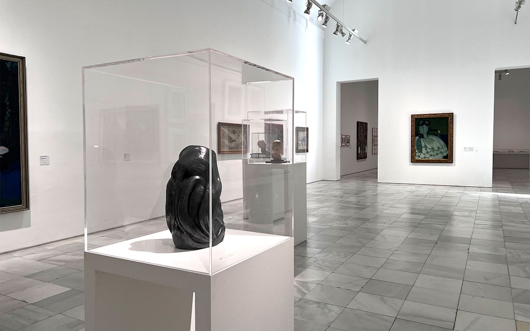 Sculpture and paintings in Reina Sofia Museum gallery, Madrid.