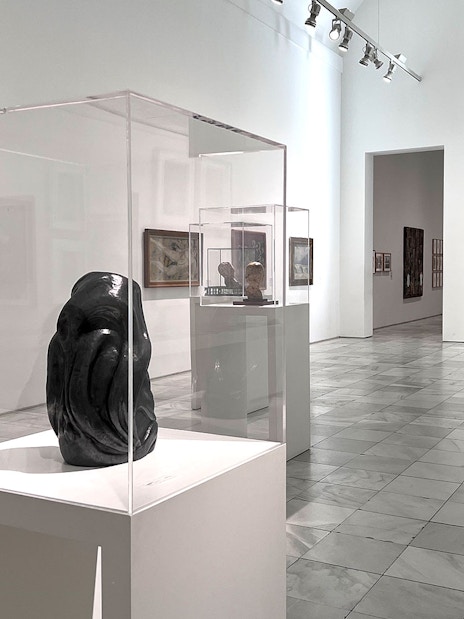 Sculpture and paintings in Reina Sofia Museum gallery, Madrid.