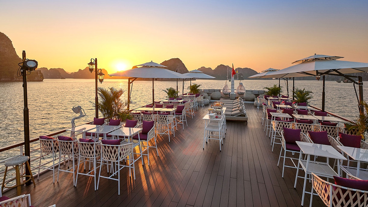 Sunset view from a luxury deck on a Ha Long Bay 5-Star Cruise, Vietnam.