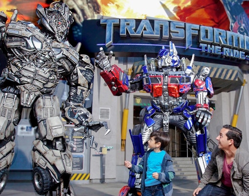TRANSFORMERS: The Ride – 3D entrance at Universal Studios Hollywood with iconic Optimus Prime statue.