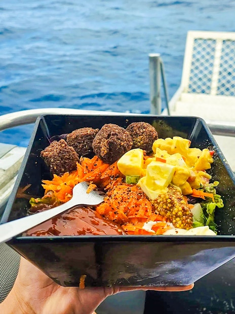 Lunch served on a boat near Fraser Island with ocean view.