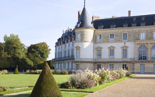 Château de Rambouillet with manicured gardens and historic architecture in France.