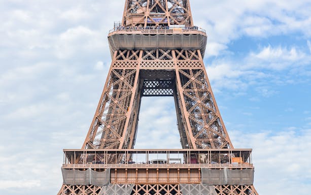 Eiffel Tower 2nd floor viewing platform, Paris, with visitors.