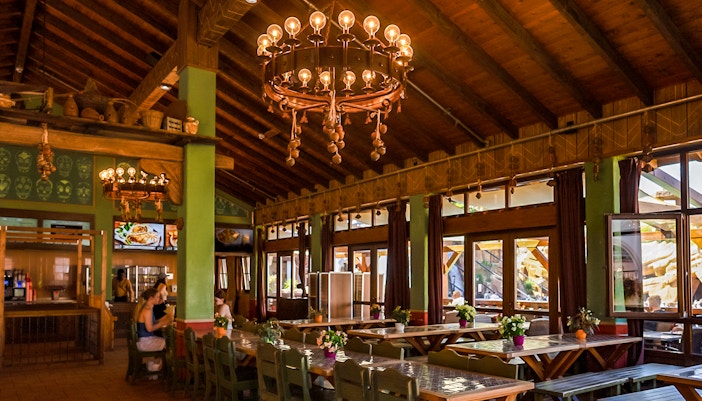 Outdoor dining area at Mexico theme park restaurant in Phantasialand with colorful decor.