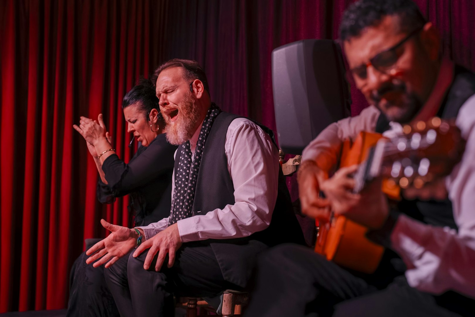 Flamenco performers at Palau Dalmases, Barcelona, with guitarist and singer.