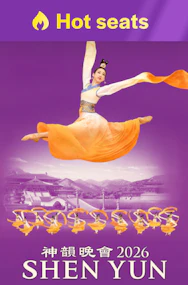 Shen Yun dancer in mid-air leap with traditional costume, 2026 performance.