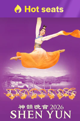 Shen Yun dancer in mid-air leap with traditional costume, 2026 performance.