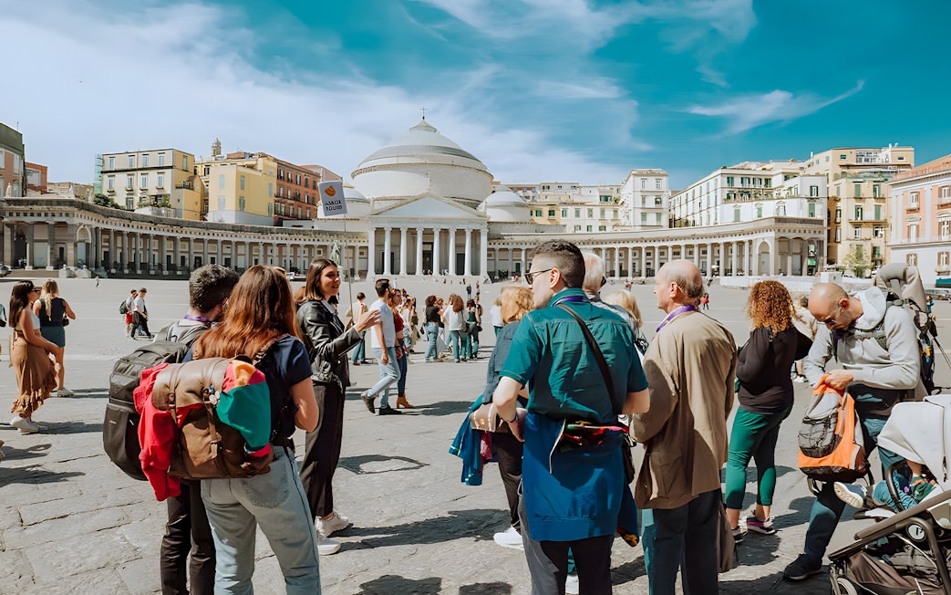 Group tour in Naples at Piazza del Plebiscito, near Castel Sant'Elmo and Certosa di San Martino.