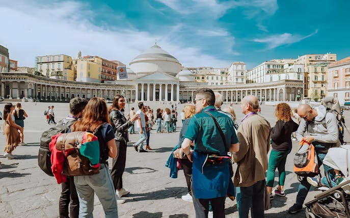 Group tour in Naples at Piazza del Plebiscito, near Castel Sant'Elmo and Certosa di San Martino.