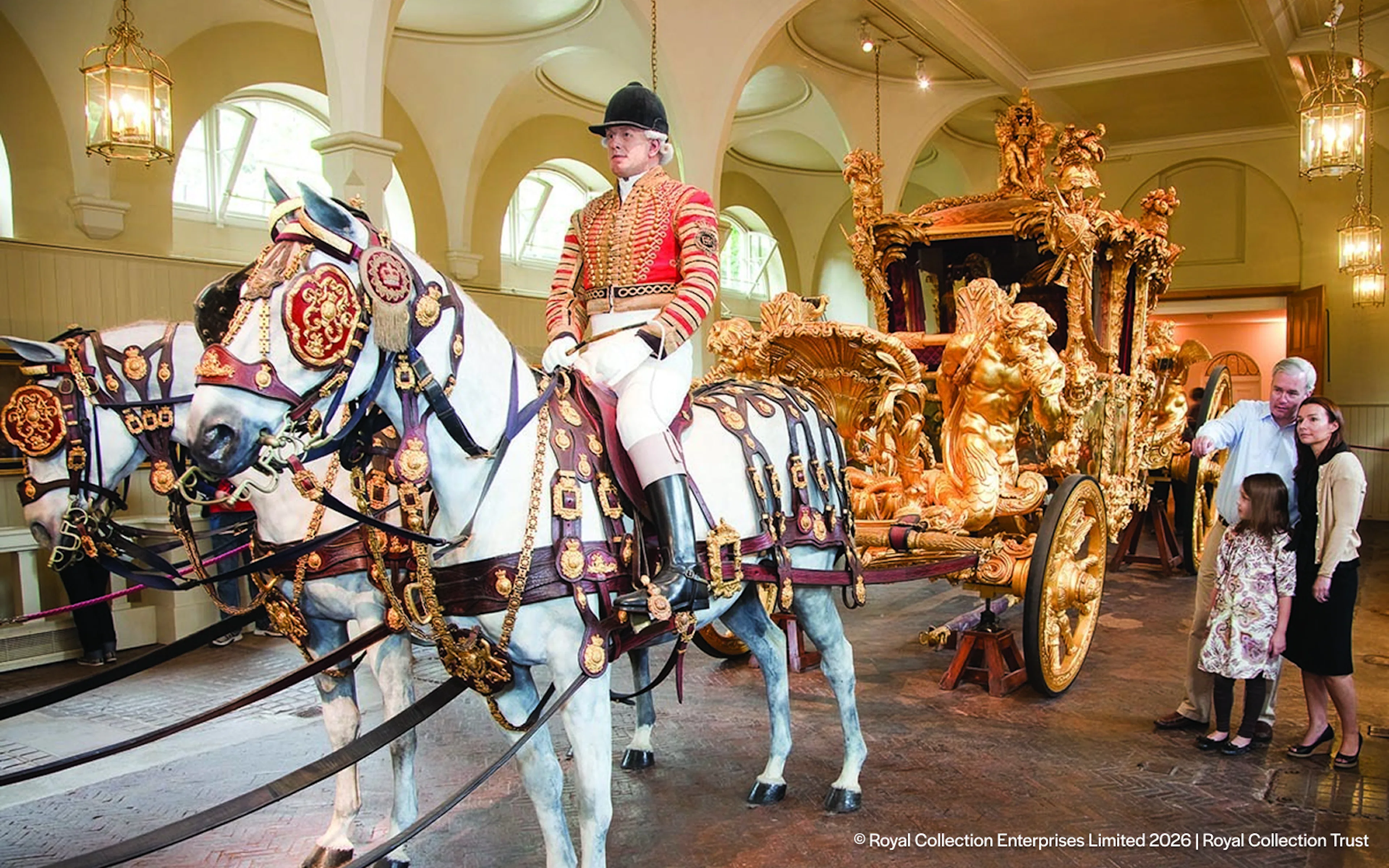 Royal Mews carriage with ornate gold details and horses, part of Changing of the Guard tour.