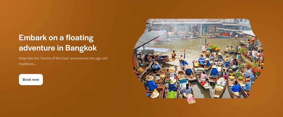 Floating market boats with vendors selling goods in Bangkok, Thailand.