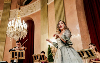 Opera singer performing at Imperial Gala Concert, Palais Auersperg, Vienna.