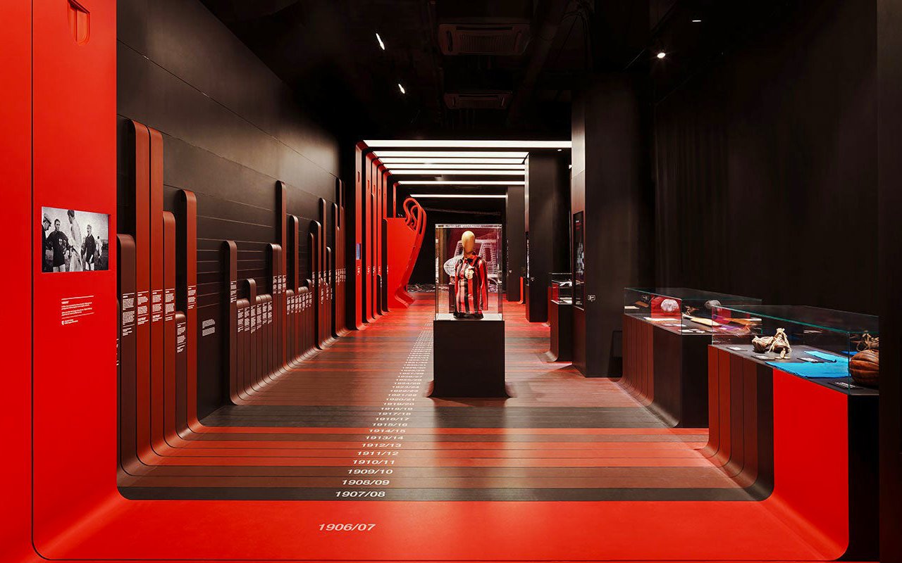 Casa Milan museum gallery with historical artefacts and timeline display.