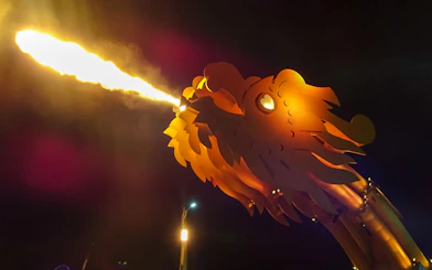 Dragon Bridge in Da Nang at night, breathing fire during motorbike tour.