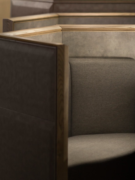 Private seating area with a table and champagne at Plaza Premium Lounge, Zone D, Taipei, Taiwan.