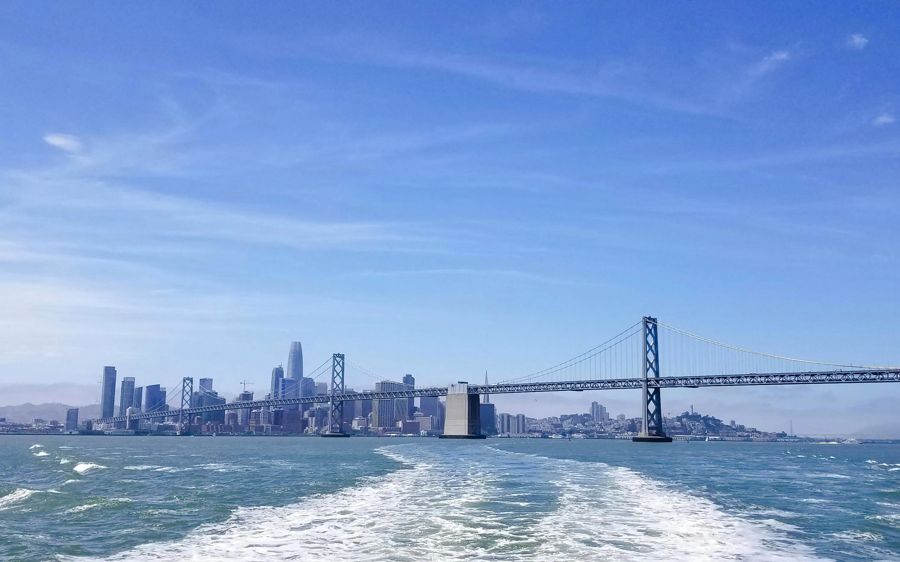 San Francisco skyline and Bay Bridge viewed from a Golden Gate Bay Cruise.