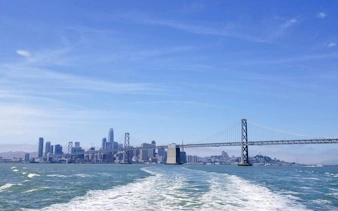 San Francisco skyline and Bay Bridge viewed from a Golden Gate Bay Cruise.