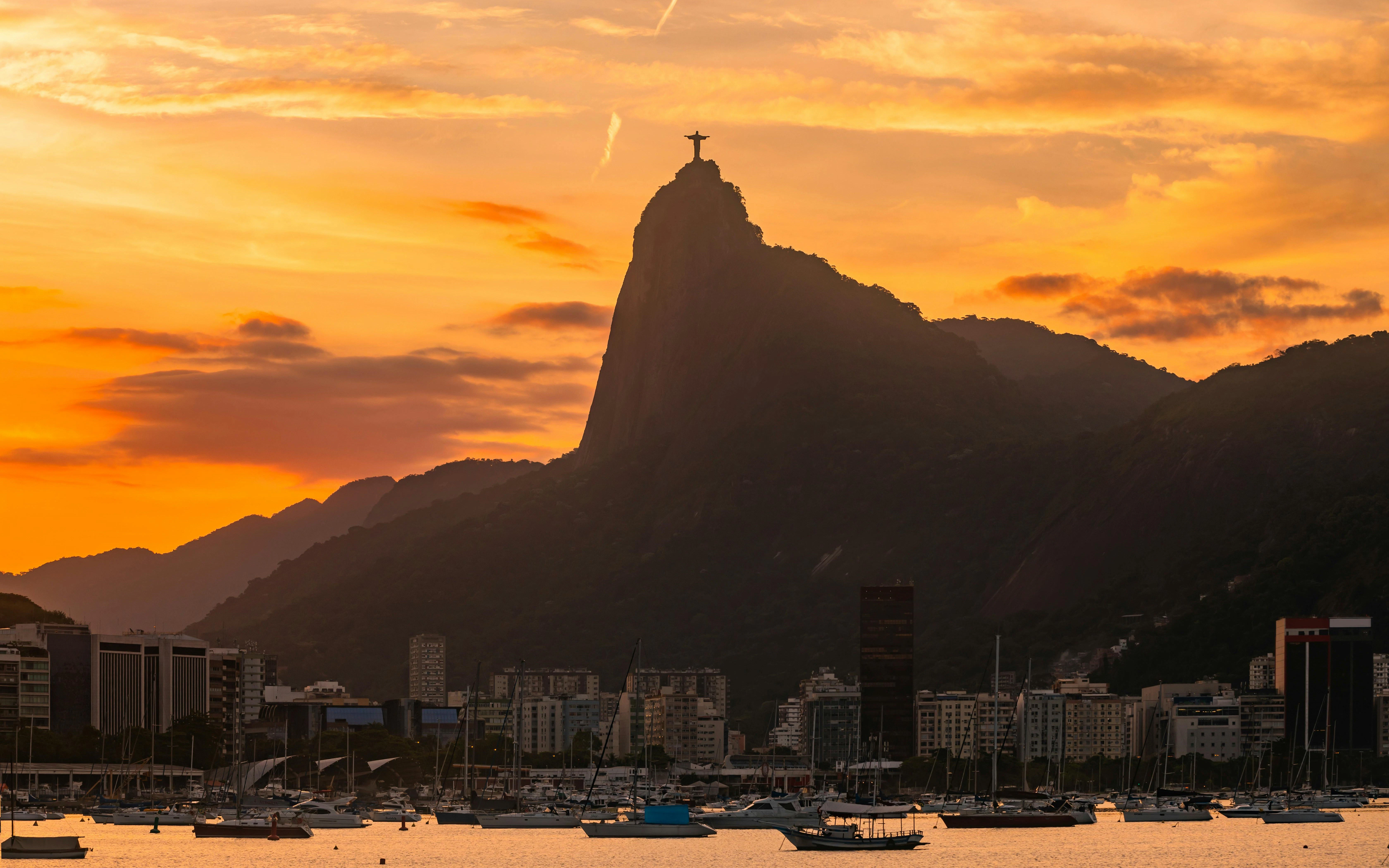 Christ the Redeemer statue on Corcovado Mountain at sunset, Rio de Janeiro.