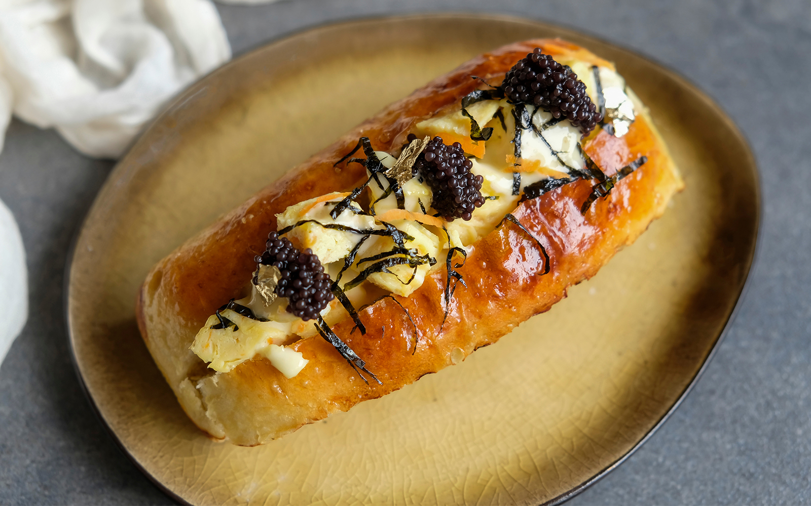 Delicious homemade pastry. Tamago Soft Bun with Caviar.