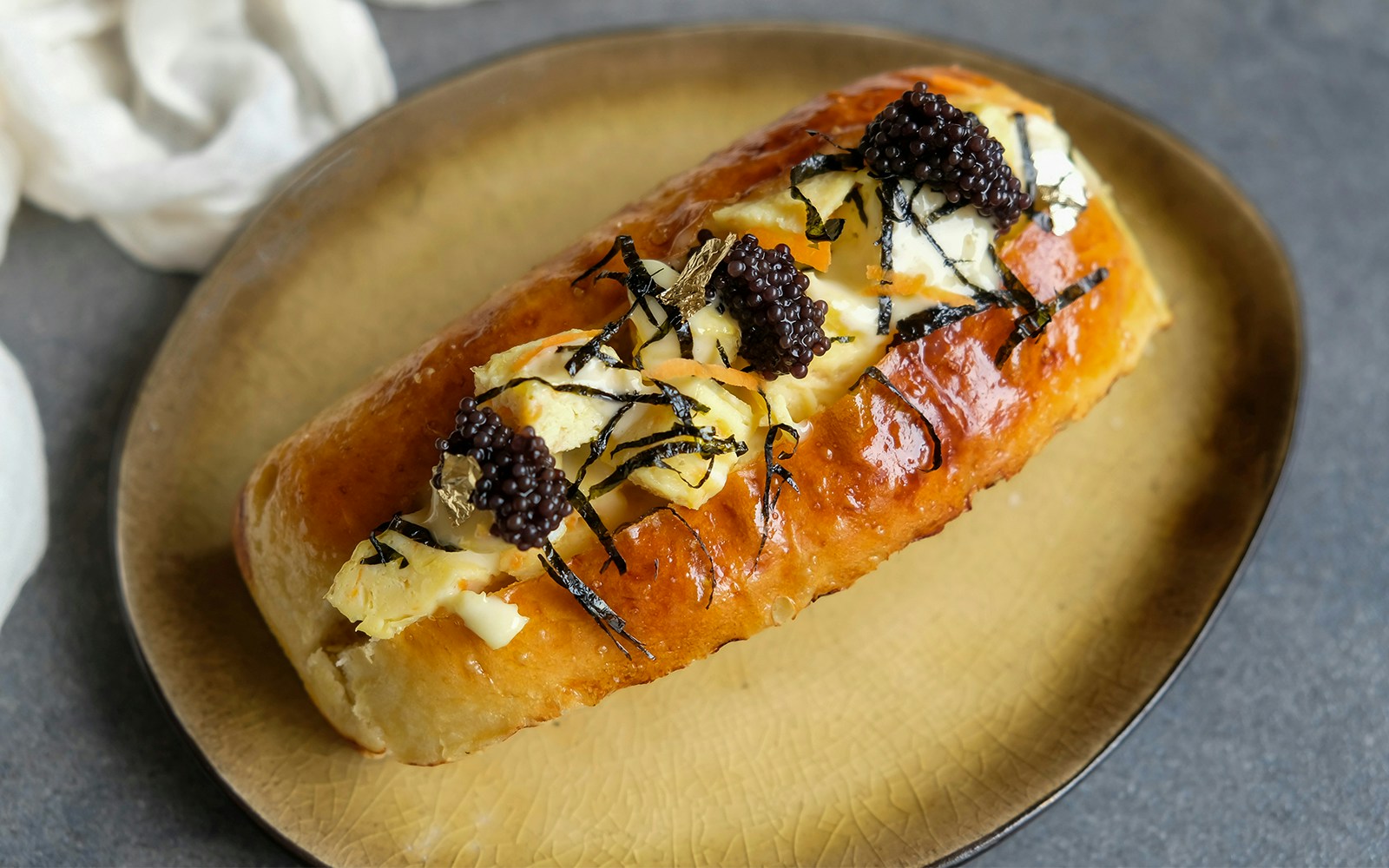 Delicious homemade pastry. Tamago Soft Bun with Caviar.